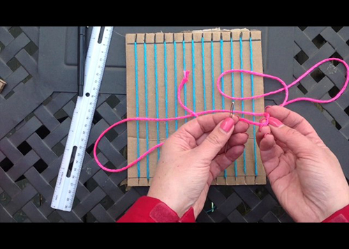 Weaving on a cardboard loom (part 1)